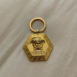 Gold metal Versace key chain